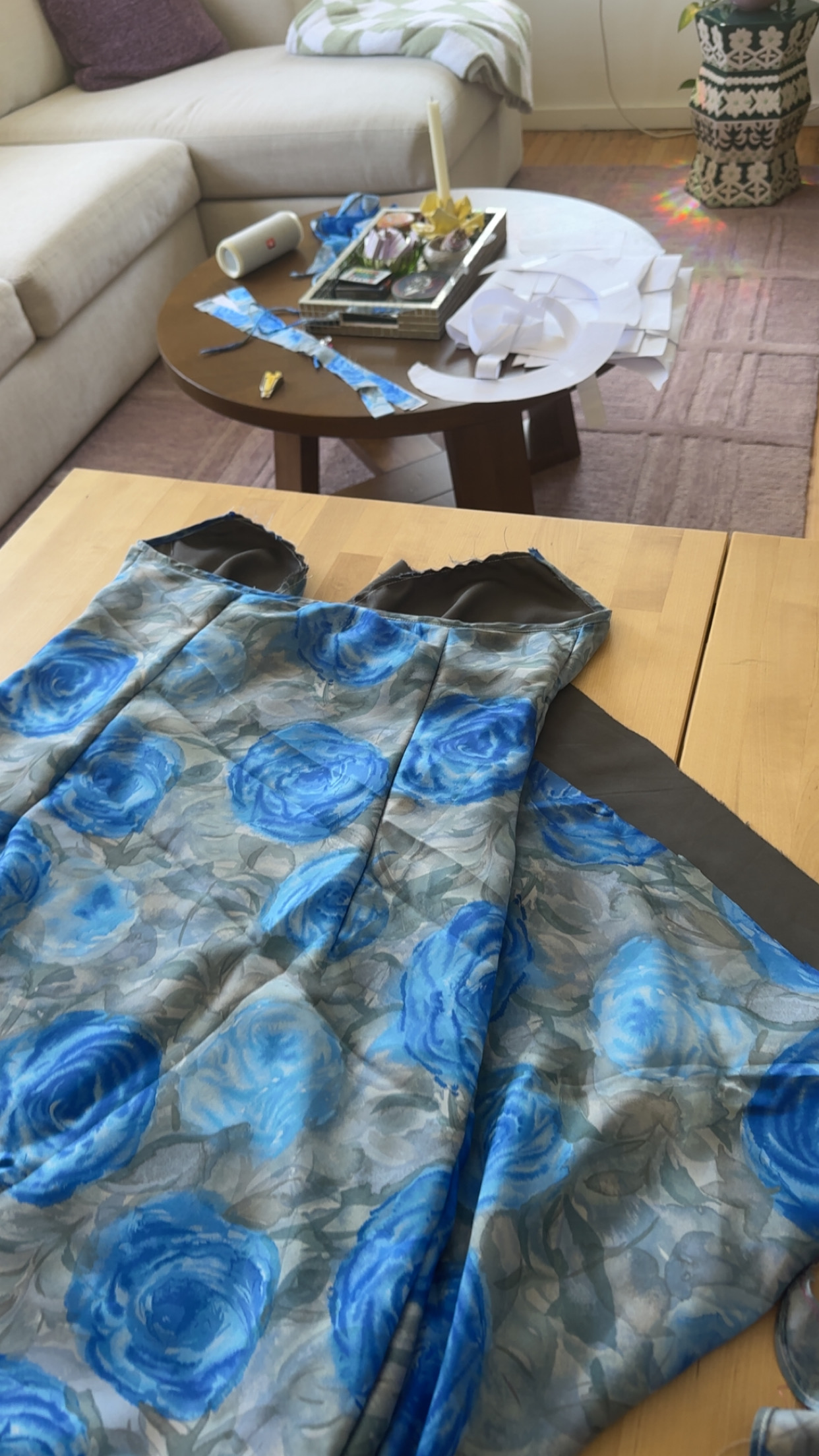 Bodice pieces with the grey lining attached, laid out on the coffee table with pattern pieces nearby
